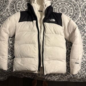 North Face kids size 10/12 white like new has double jacket